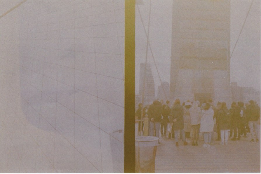soft photograph of brooklyn bridge details and tour group
