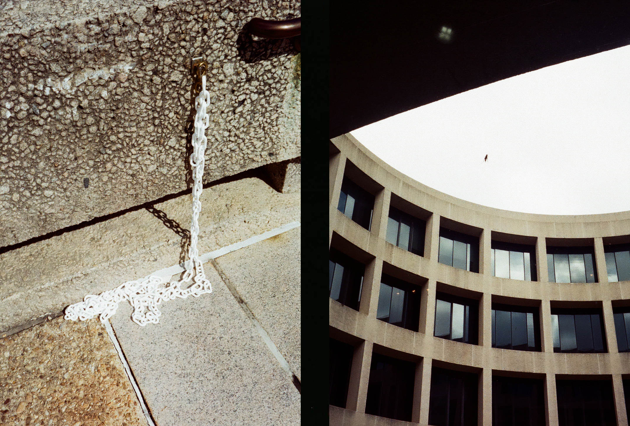 a white chain hangs from a wall and a view of windows from the courtyard of a circular building